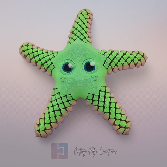3D printed starfish with mesh articulated arms in a random pastel rainbow colour