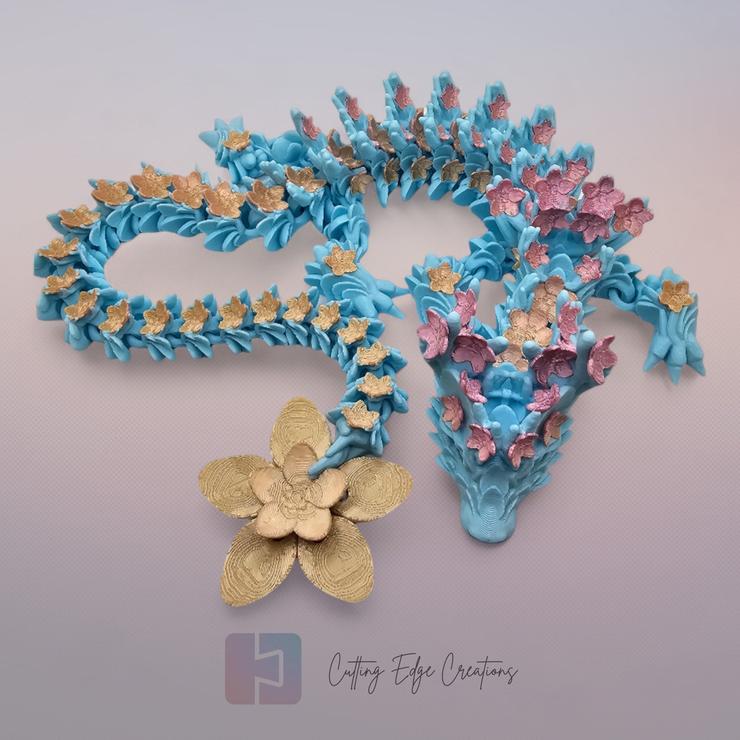3D printed articulated Cherry Blossom Dragon, flexible toy, handmade in the UK, desk fidget and gift.