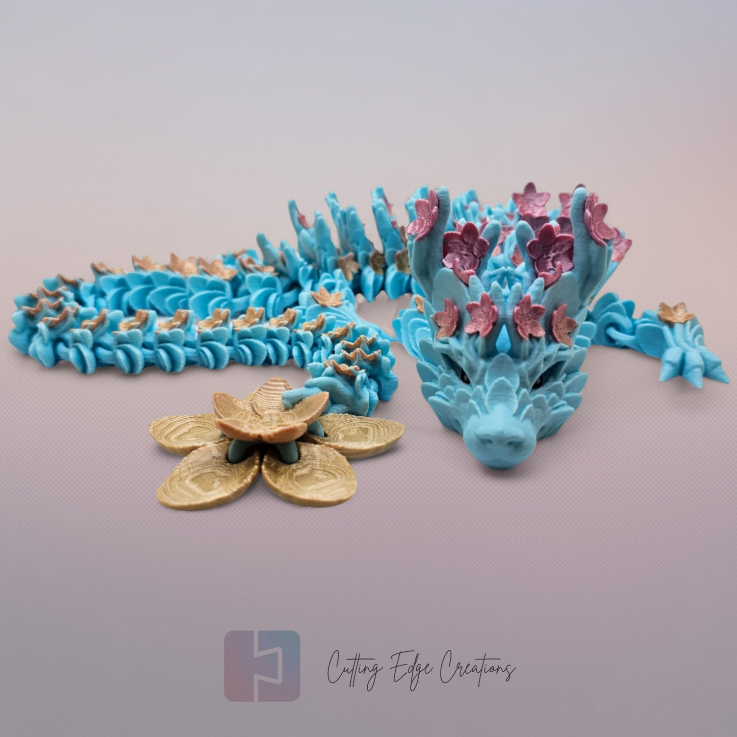 3D printed articulated Cherry Blossom Dragon, flexible toy, handmade in the UK, desk fidget and gift.