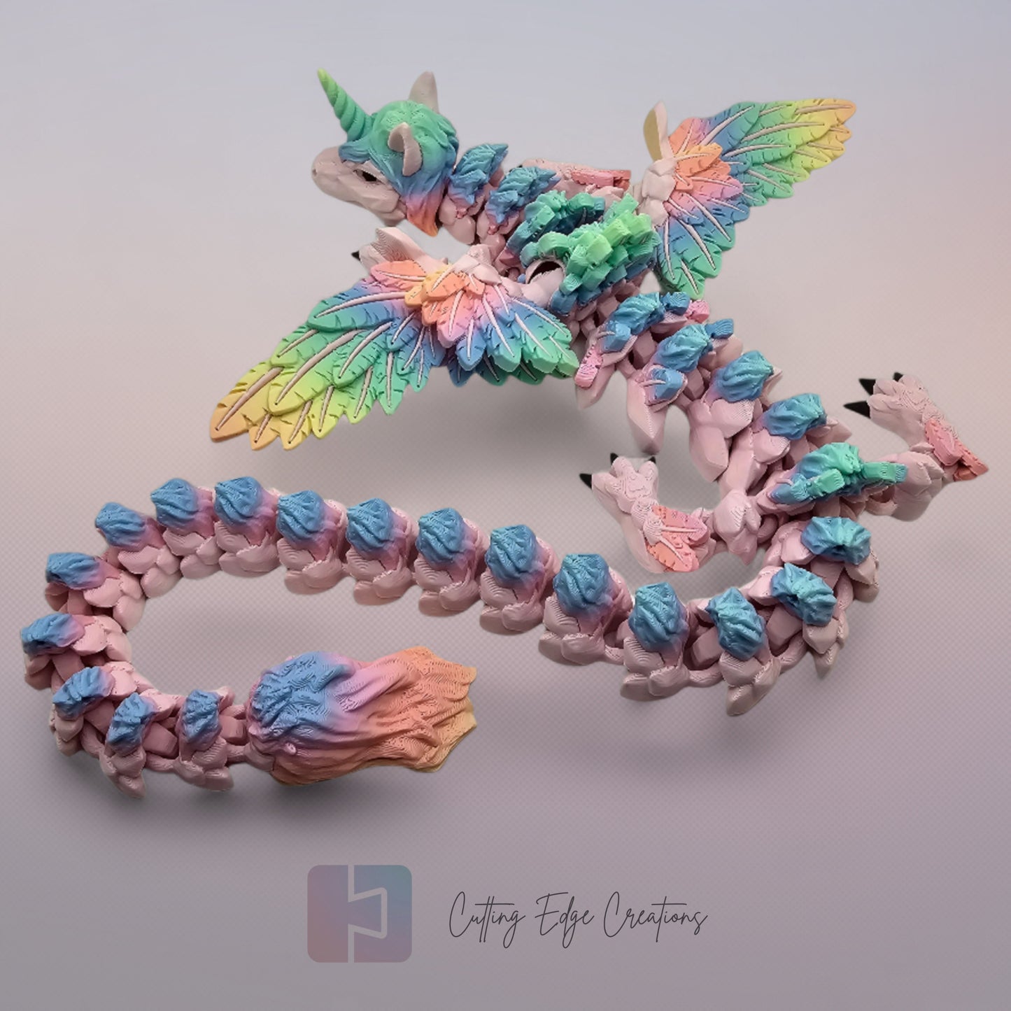 3D printed articulated Unicorn Dragon, flexible toy, handmade in the UK, desk fidget and gift.