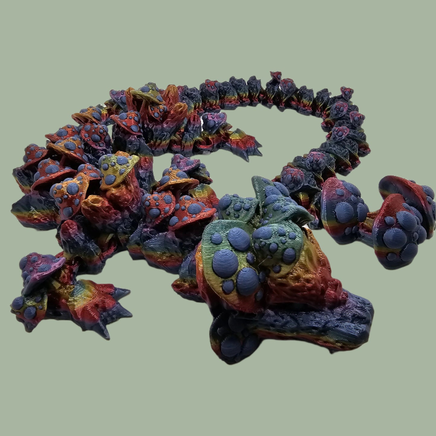 3D printed articulated dragon with mushroom details along the body
