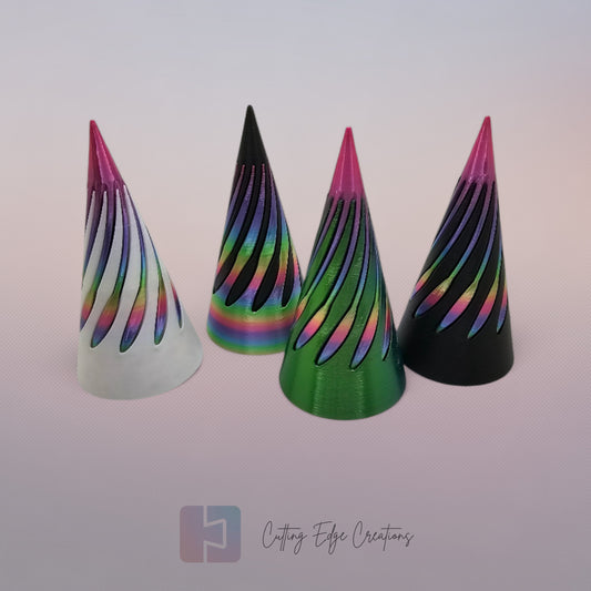 vibrant 3D-printed Infinity Cones V2, each featuring a sleek spiral cut design. The cones are in a random colour, including white, green, black, and rainbow gradients. Designed for smooth sliding and fidgeting, these eye-catching desk toys are handmade in the UK