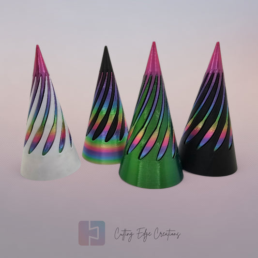 vibrant 3D-printed Infinity Cones V2, each featuring a sleek spiral cut design. The cones are in a random colour, including white, green, black, and rainbow gradients. Designed for smooth sliding and fidgeting, these eye-catching desk toys are handmade in the UK