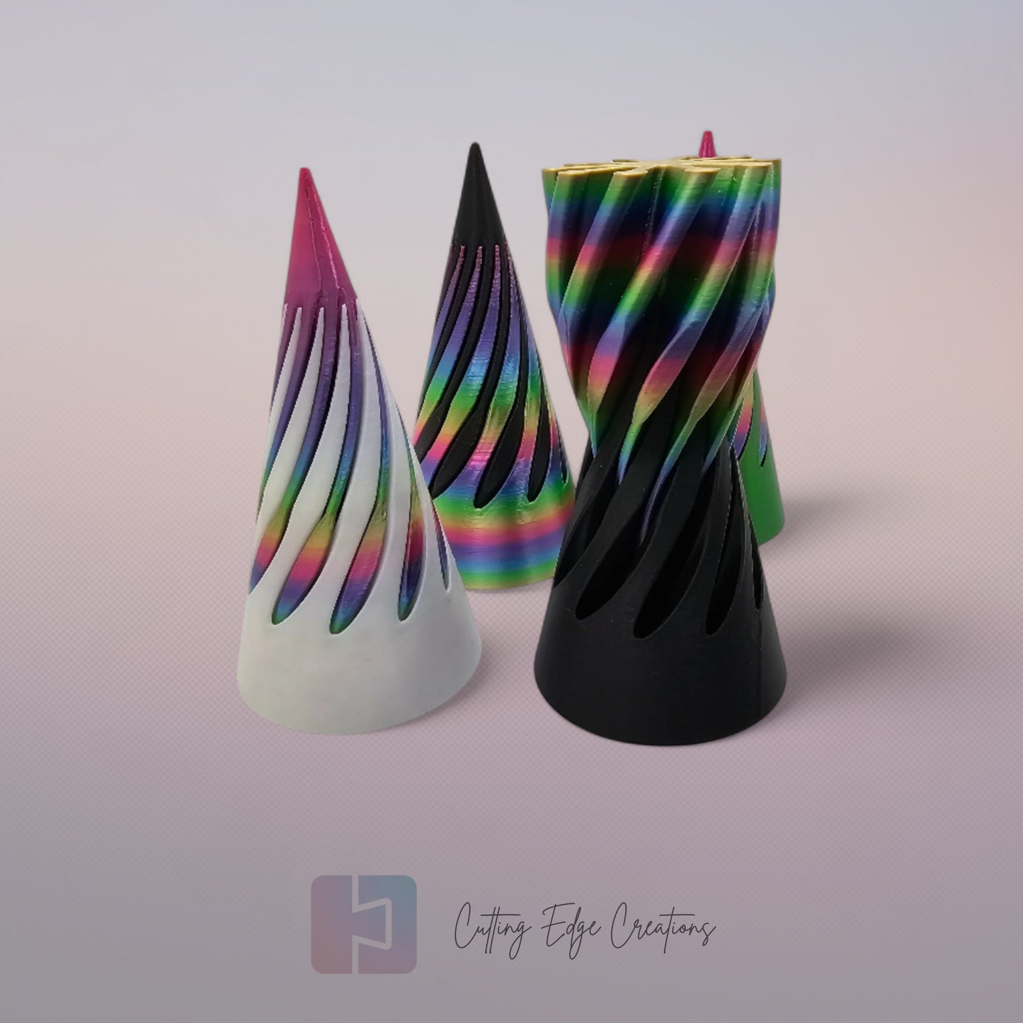 vibrant 3D-printed Infinity Cones V2, each featuring a sleek spiral cut design. The cones are in a random colour, including white, green, black, and rainbow gradients. Designed for smooth sliding and fidgeting, these eye-catching desk toys are handmade in the UK