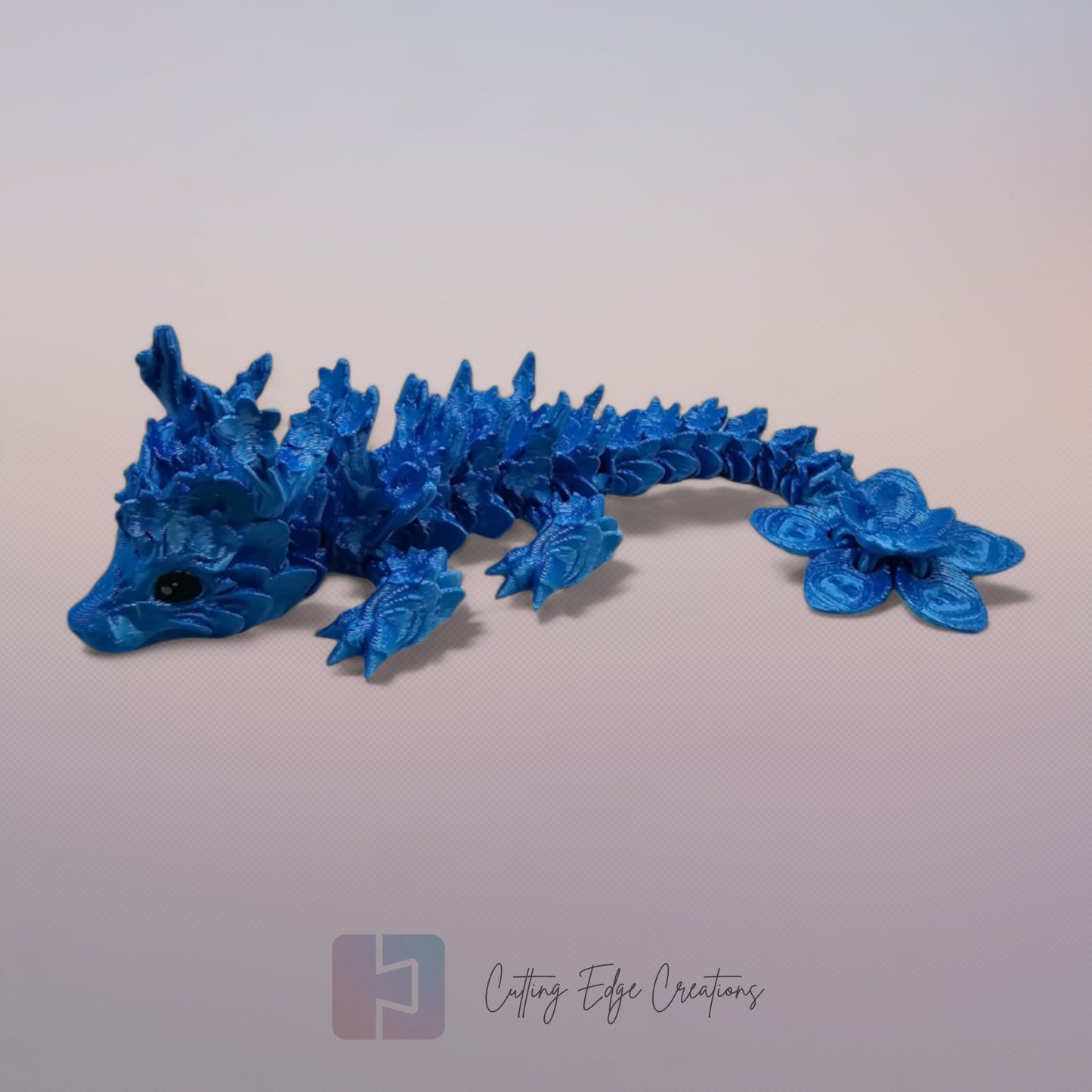 3D printed articulated Cherry Blossom Dragon, flexible toy, handmade in the UK, desk fidget and gift.