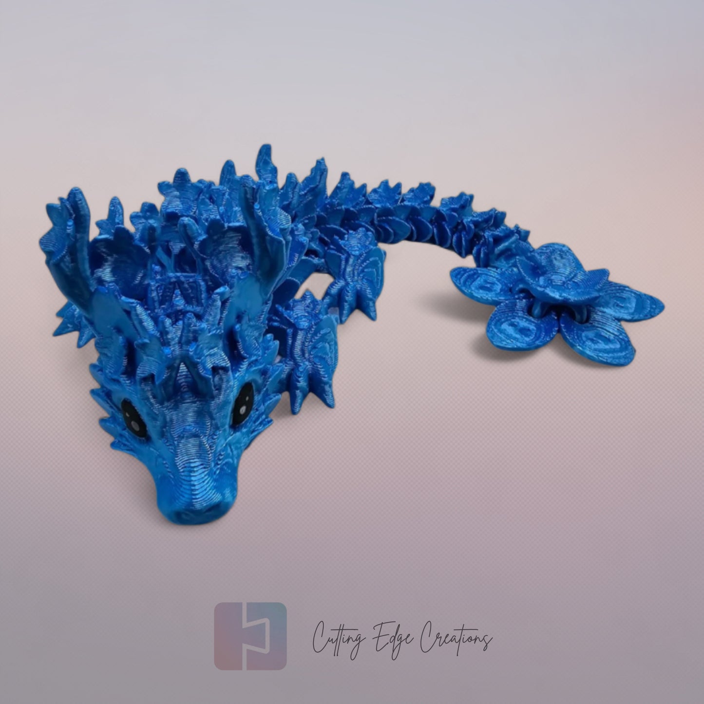 3D printed articulated Cherry Blossom Dragon, flexible toy, handmade in the UK, desk fidget and gift.