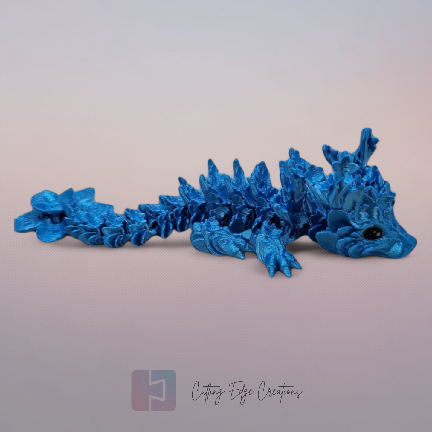 3D printed articulated Cherry Blossom Dragon, flexible toy, handmade in the UK, desk fidget and gift.