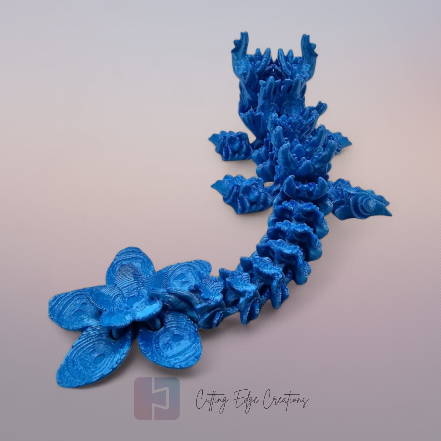 3D printed articulated Cherry Blossom Dragon, flexible toy, handmade in the UK, desk fidget and gift.