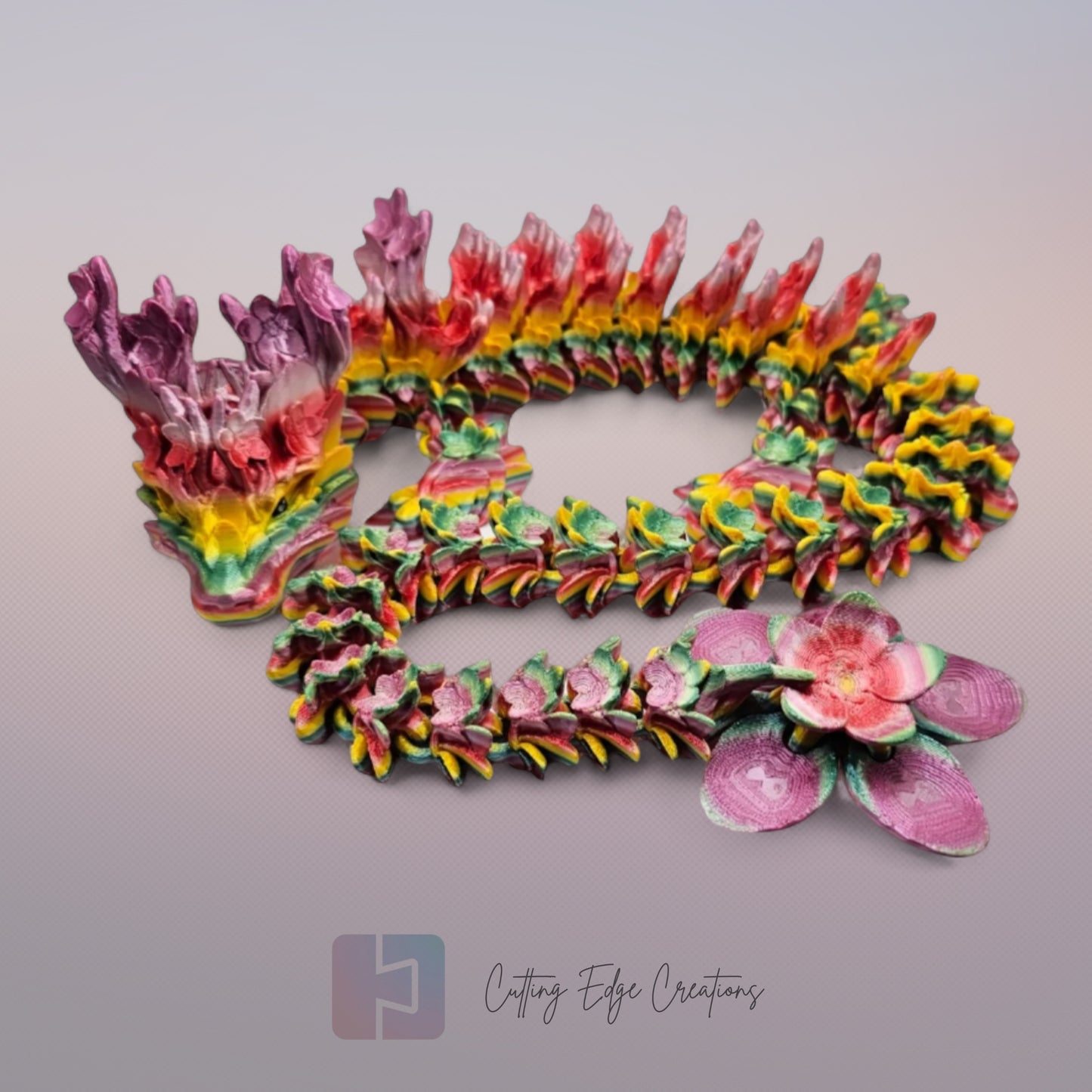 3D printed articulated Cherry Blossom Dragon, flexible toy, handmade in the UK, desk fidget and gift.