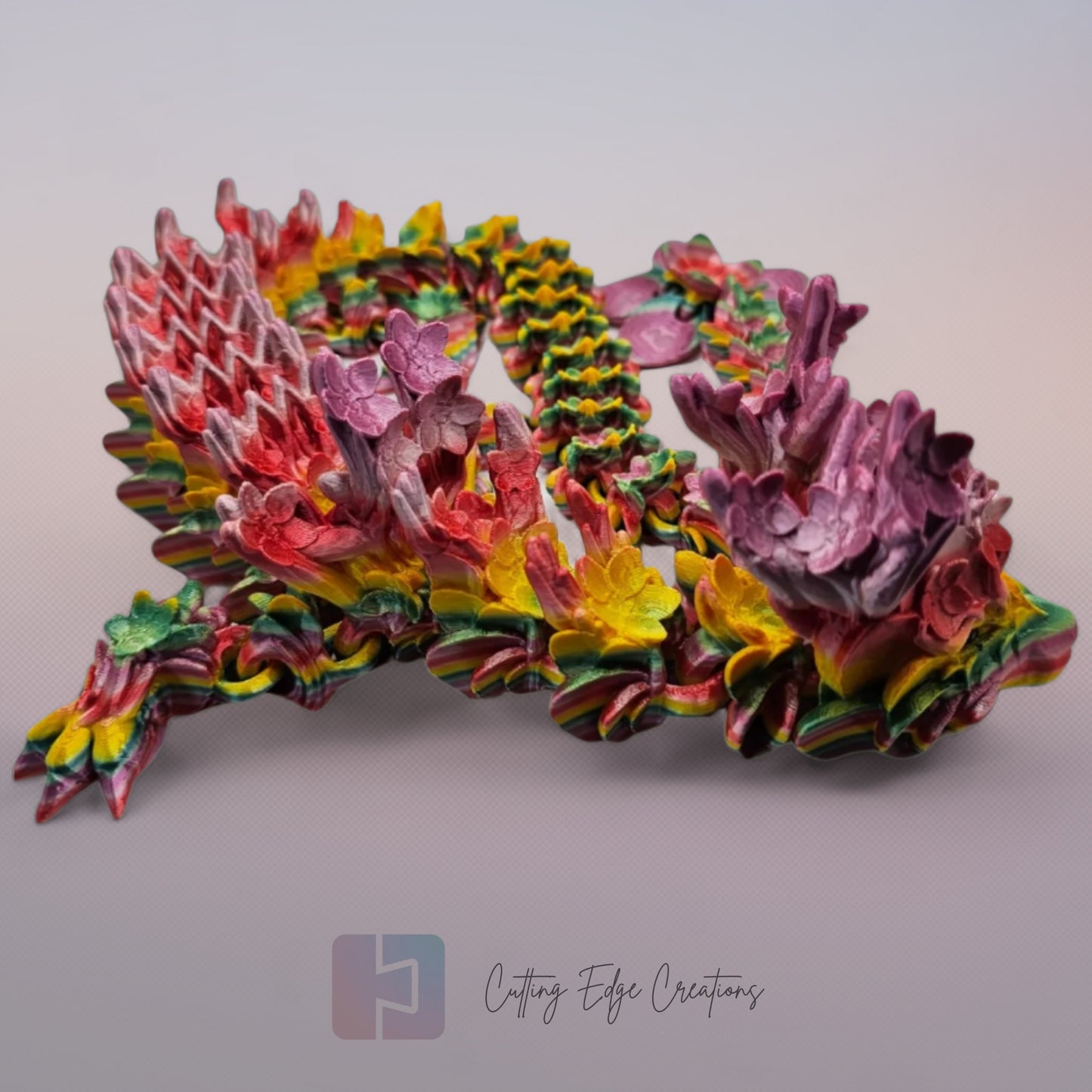 3D printed articulated Cherry Blossom Dragon, flexible toy, handmade in the UK, desk fidget and gift.