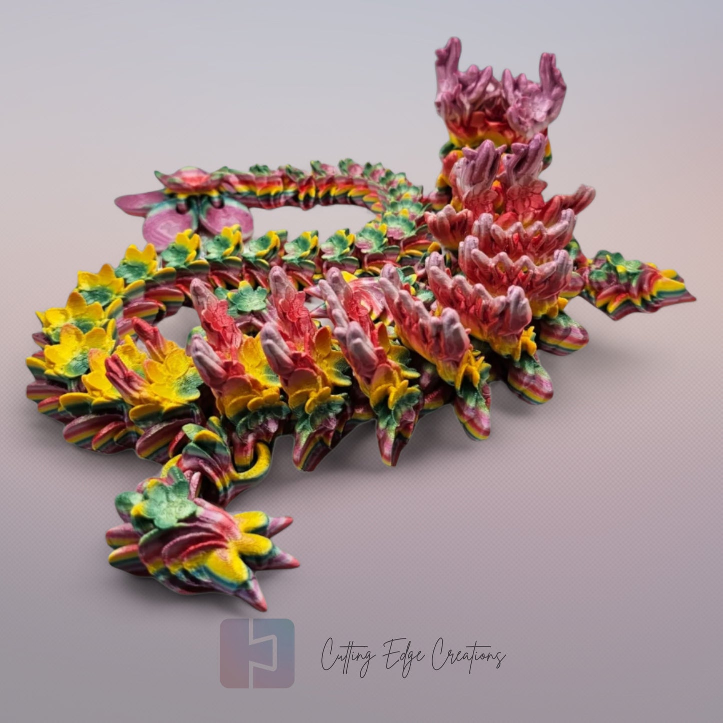3D printed articulated Cherry Blossom Dragon, flexible toy, handmade in the UK, desk fidget and gift.
