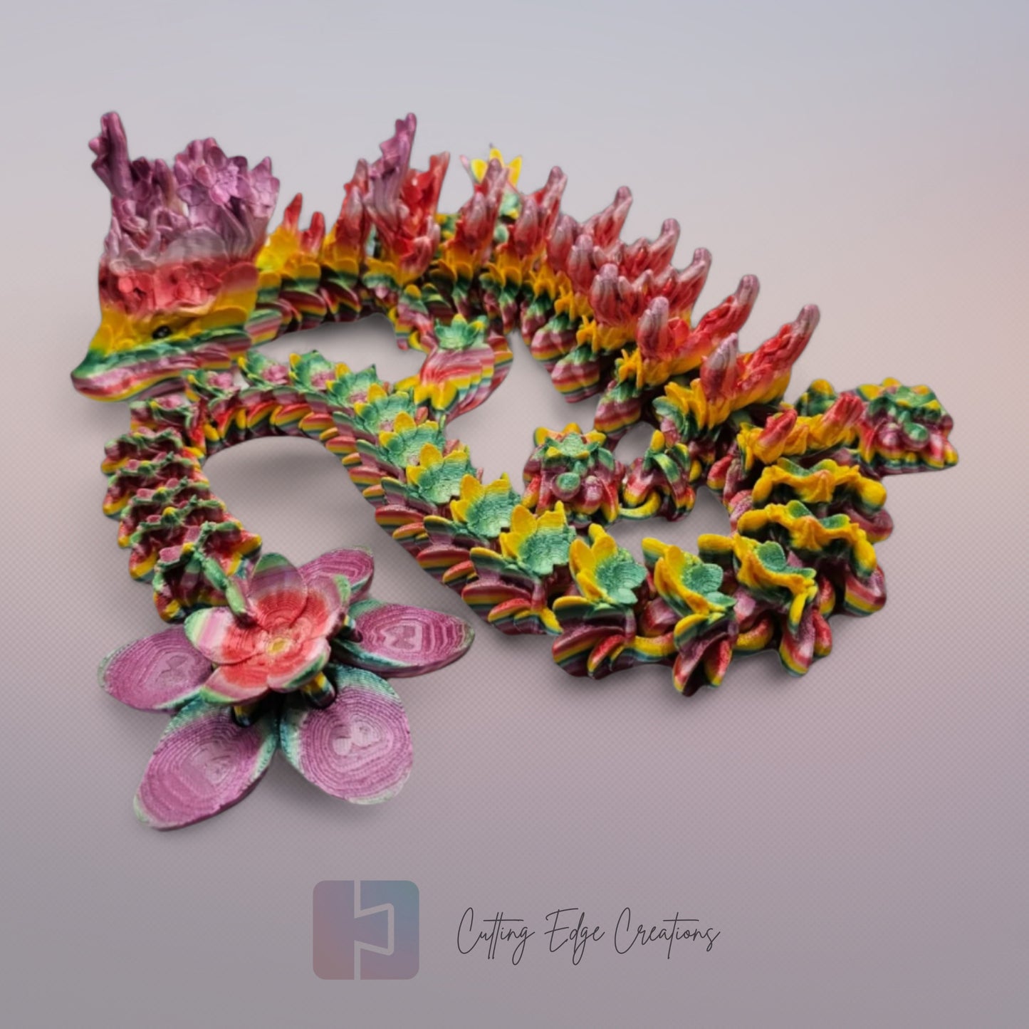 3D printed articulated Cherry Blossom Dragon, flexible toy, handmade in the UK, desk fidget and gift.