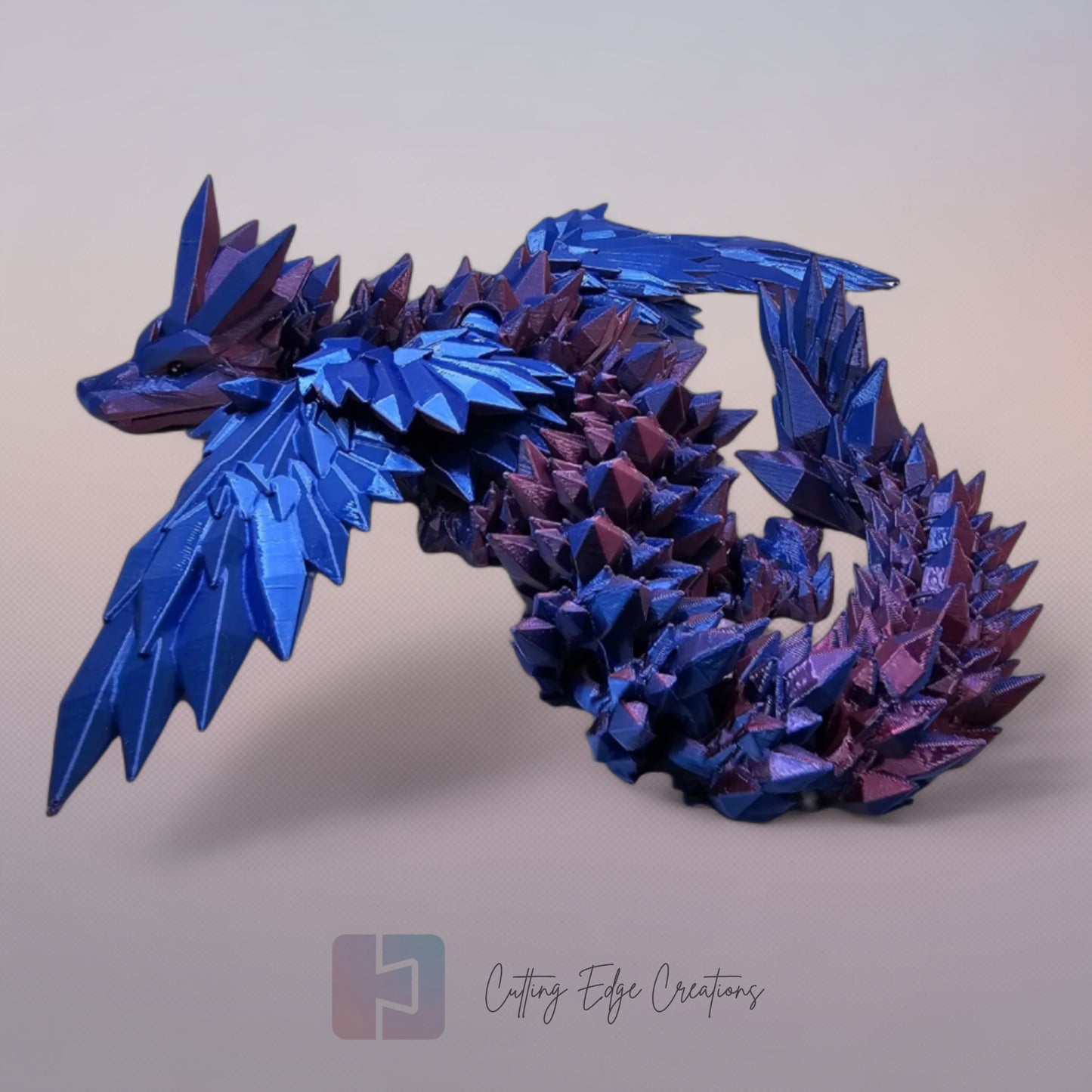 3D printed articulated Crystal Wing Dragon, flexible toy, handmade in the UK, desk fidget and gift.