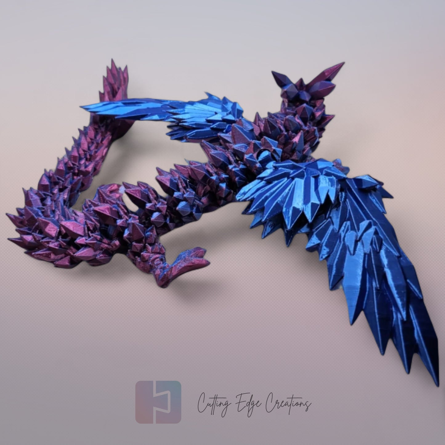 3D printed articulated Crystal Wing Dragon, flexible toy, handmade in the UK, desk fidget and gift.