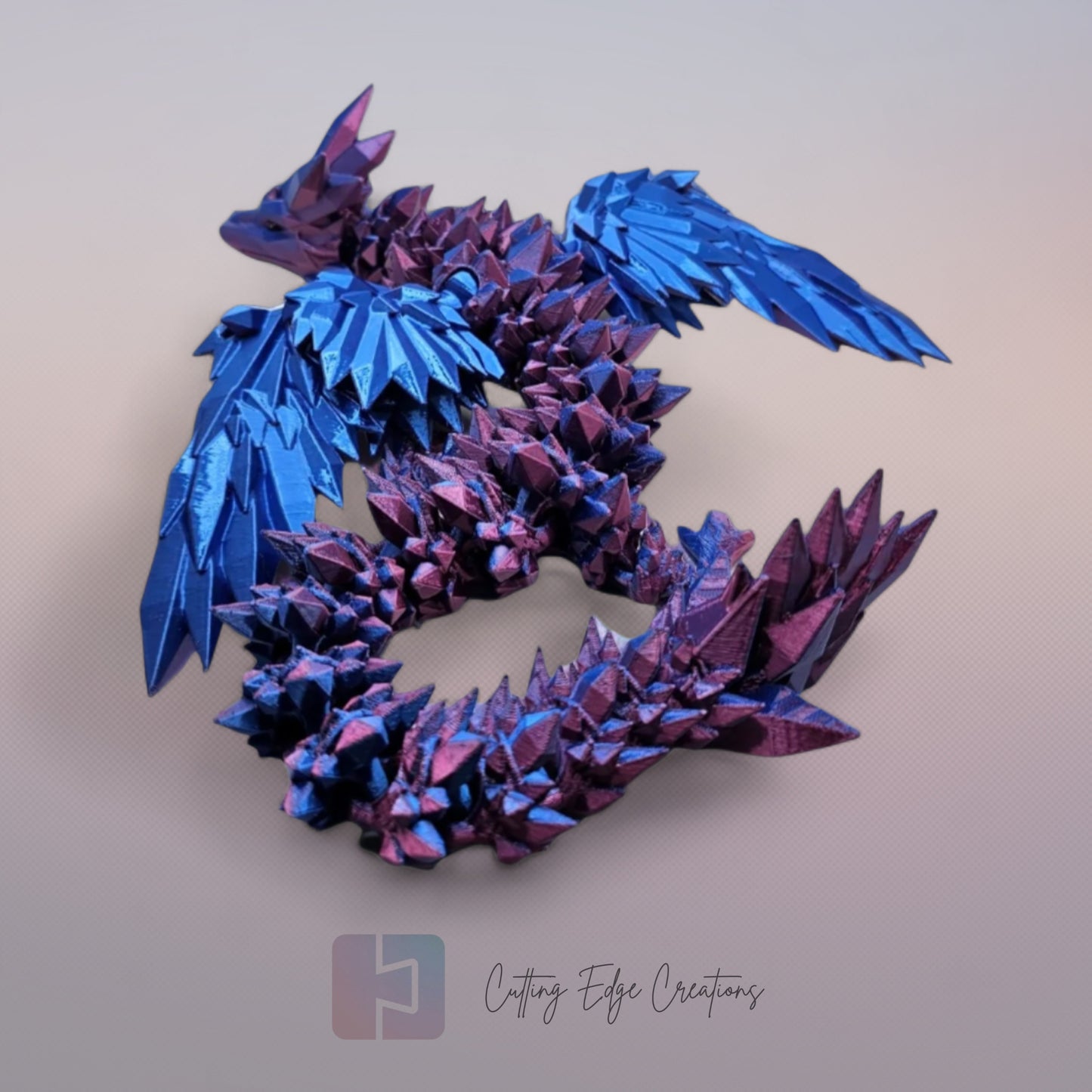 3D printed articulated Crystal Wing Dragon, flexible toy, handmade in the UK, desk fidget and gift.