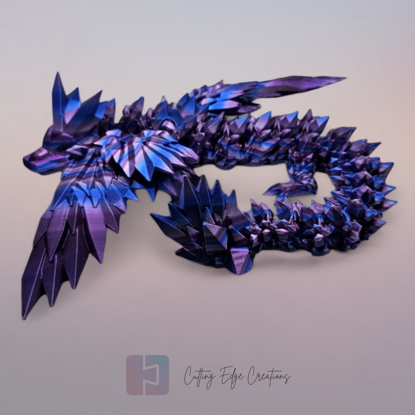 3D printed articulated Crystal Wing Dragon, flexible toy, handmade in the UK, desk fidget and gift.
