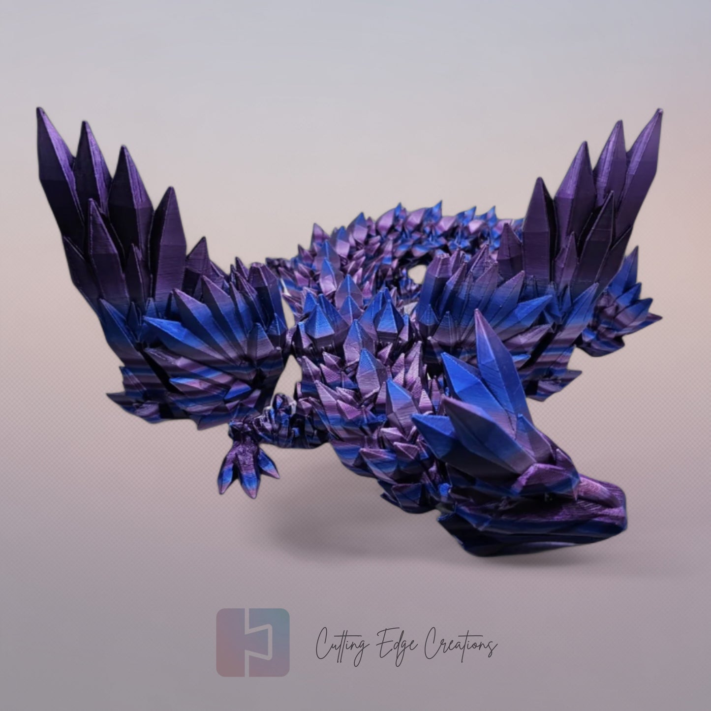 3D printed articulated Crystal Wing Dragon, flexible toy, handmade in the UK, desk fidget and gift.