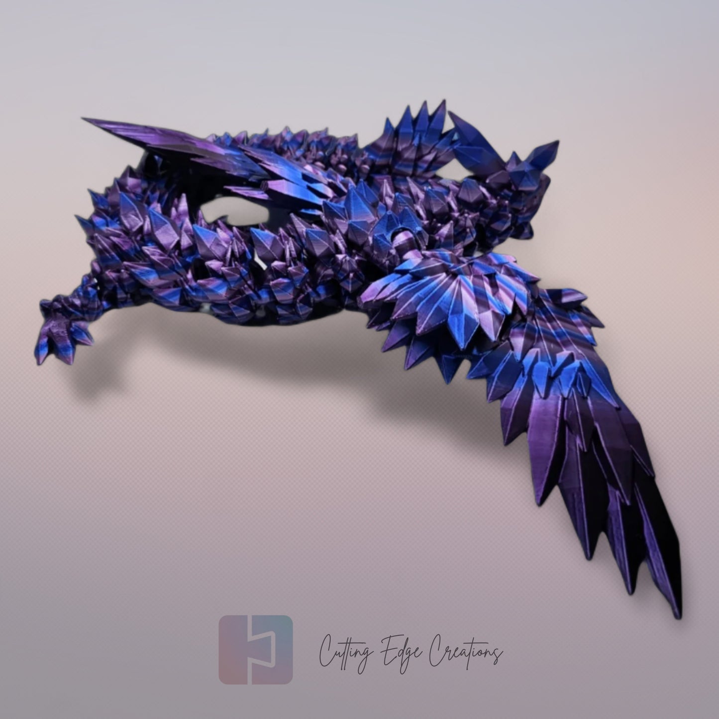 3D printed articulated Crystal Wing Dragon, flexible toy, handmade in the UK, desk fidget and gift.