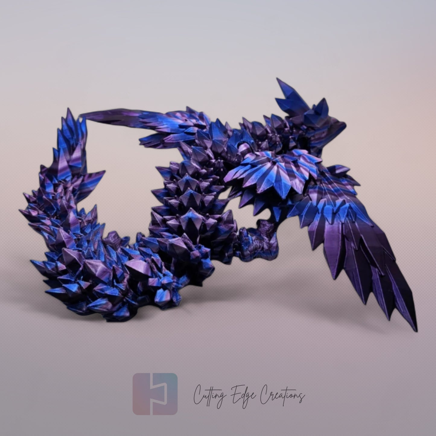 3D printed articulated Crystal Wing Dragon, flexible toy, handmade in the UK, desk fidget and gift.