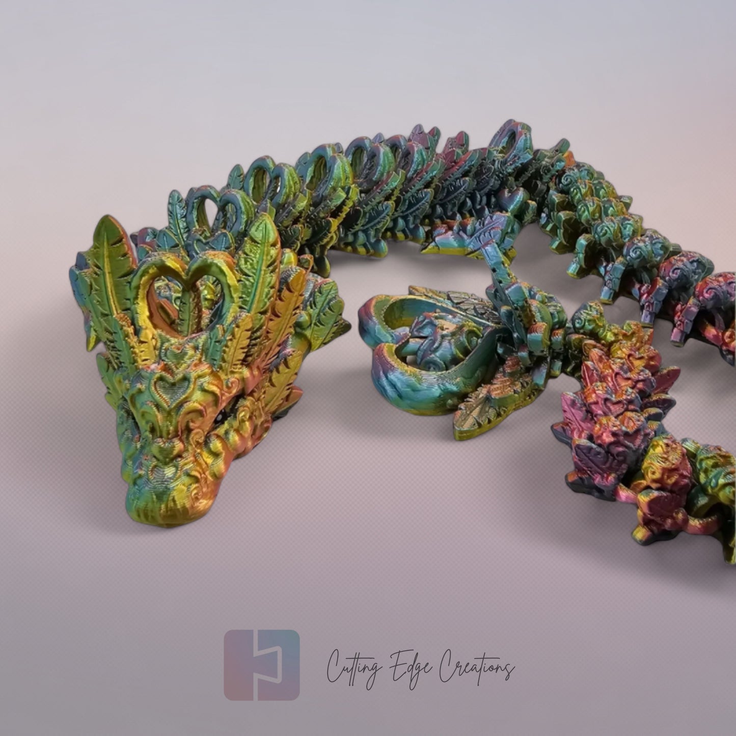 3D printed articulated Heart Dragon, flexible toy, handmade in the UK, desk fidget and gift.