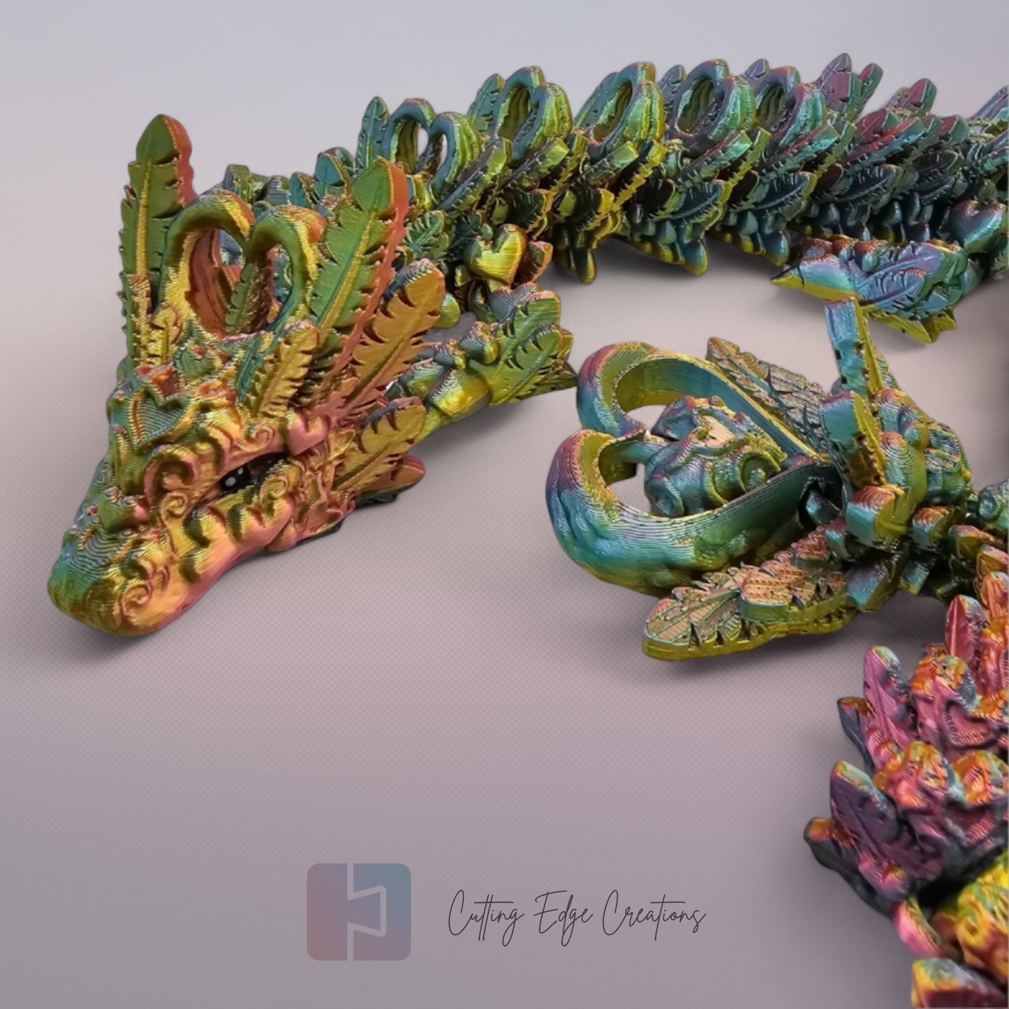 3D printed articulated Heart Dragon, flexible toy, handmade in the UK, desk fidget and gift.