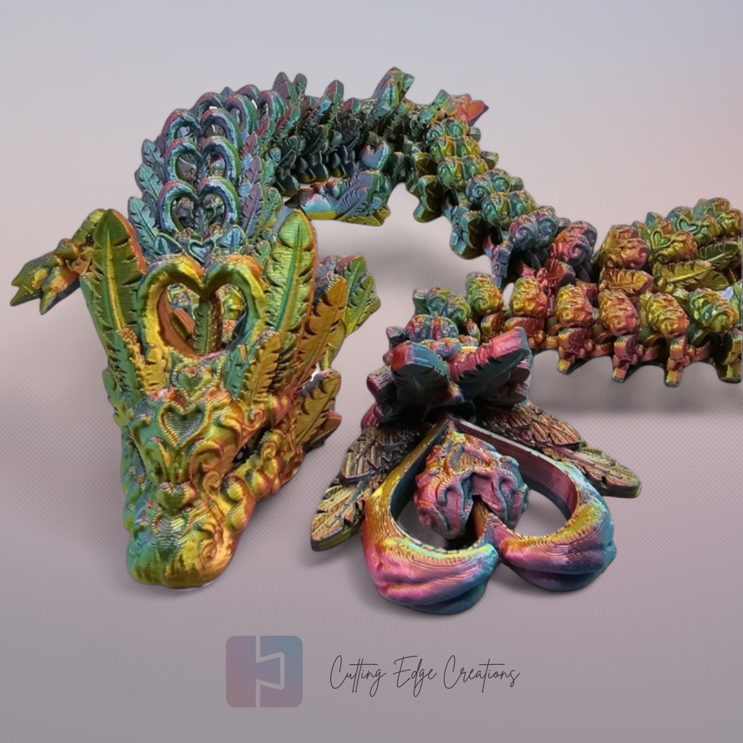 3D printed articulated Heart Dragon, flexible toy, handmade in the UK, desk fidget and gift.