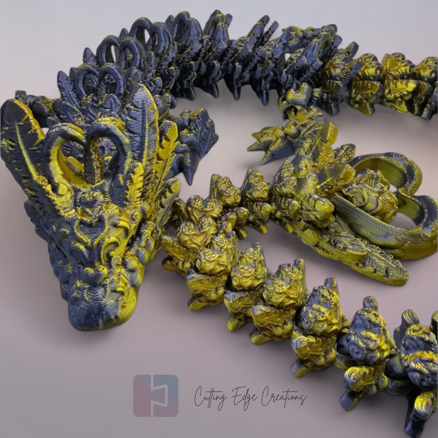 3D printed articulated Heart Dragon, flexible toy, handmade in the UK, desk fidget and gift.