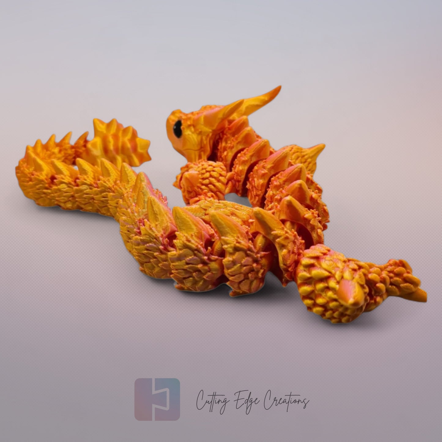 3D printed articulated Horned Menace Dragon, flexible toy, handmade in the UK, desk fidget and gift.