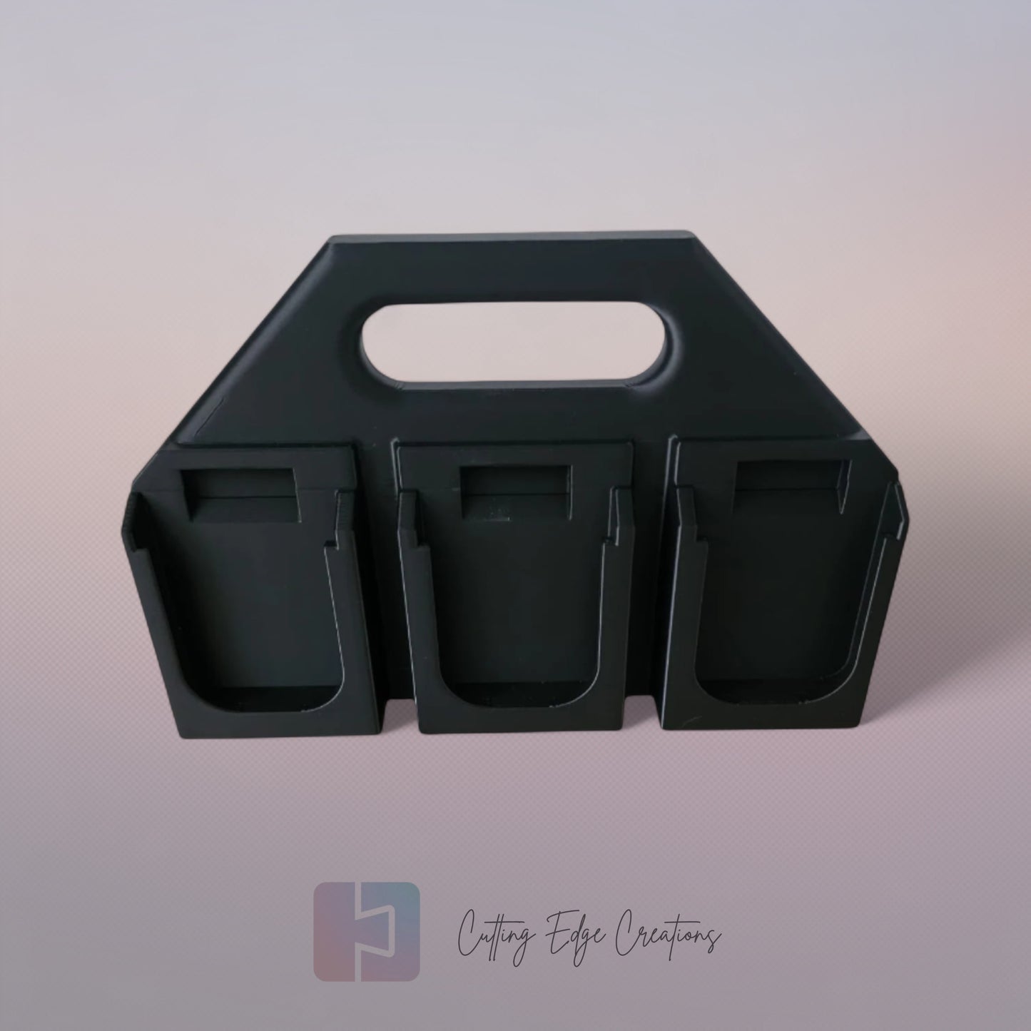 Black 3D printed battery caddy holding six Makita-compatible batteries with built-in carry handle