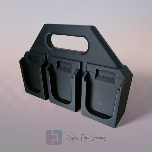Black 3D printed battery caddy holding six Makita-compatible batteries with built-in carry handle