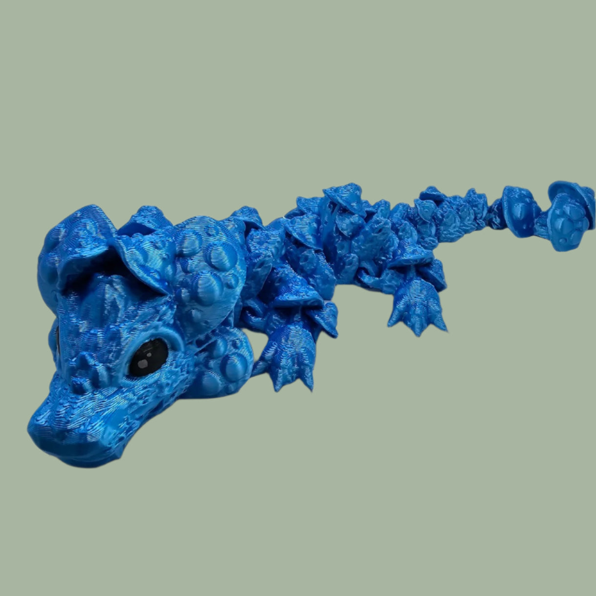 3D printed articulated dragon with mushroom details along the body