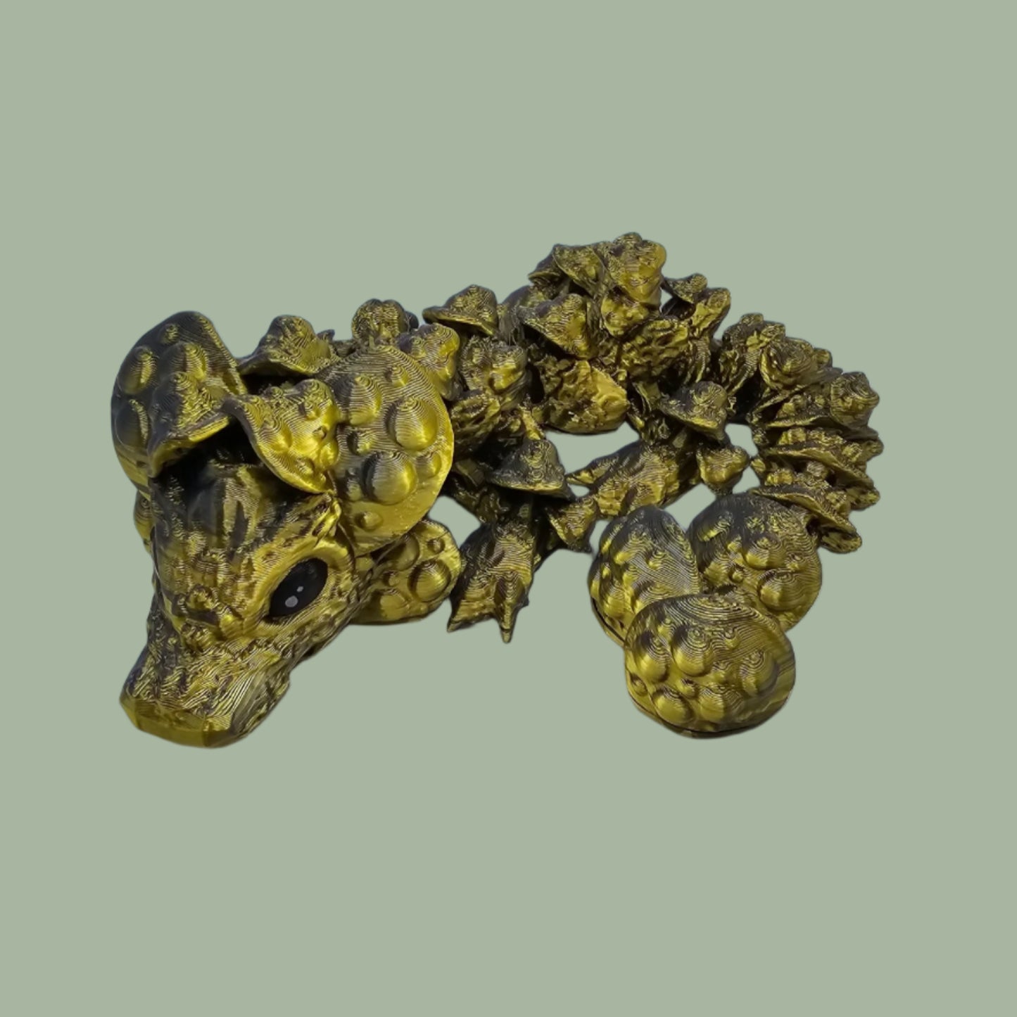 3D printed articulated dragon with mushroom details along the body