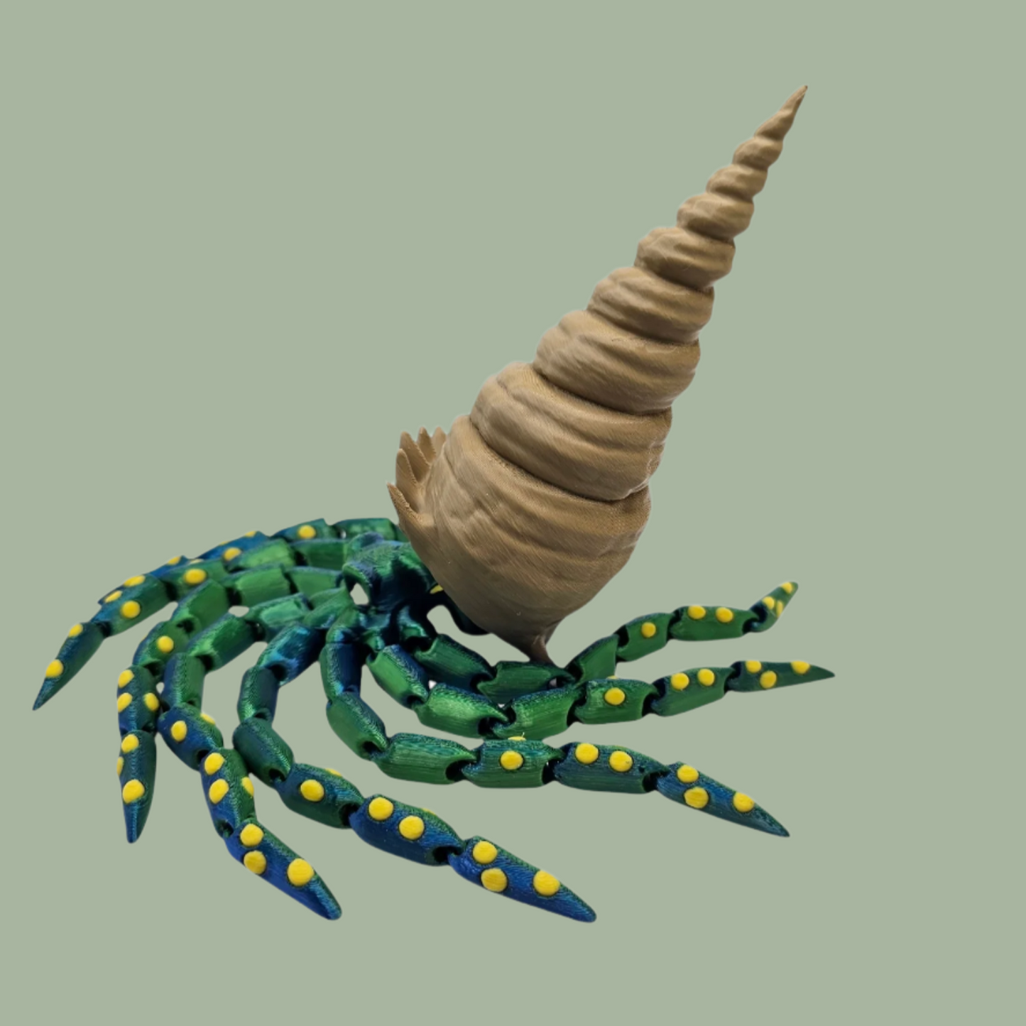 3D printed articulated green octopus with yellow spots and removeable shell hat