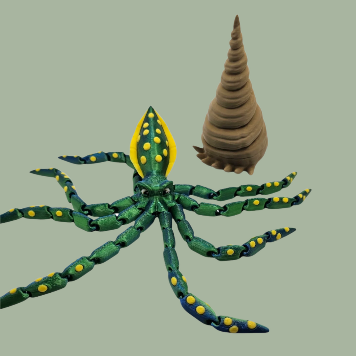 3D printed articulated green octopus with yellow spots and removeable shell hat
