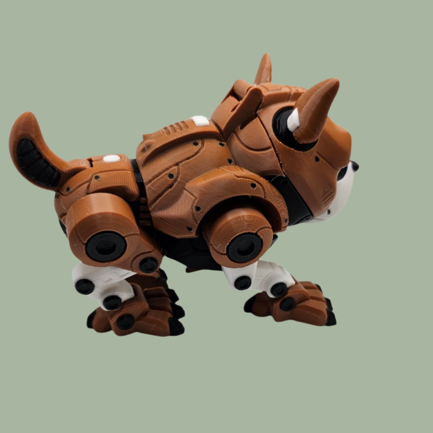3D printed cyber dog in brown, white, black, and blue, with an openable face revealing a hamster driving the machine