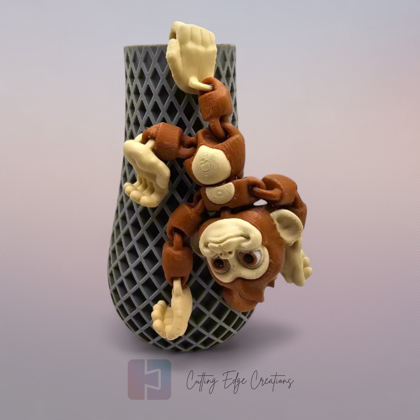 3D printed articulated monkey with hook tail, hook hands, and hook feet