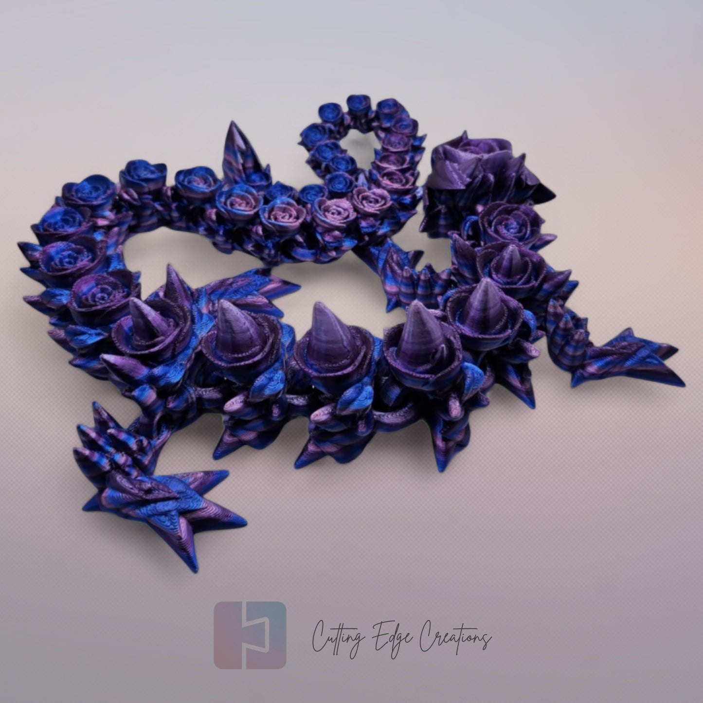 3D printed articulated Rose Dragon, flexible toy, handmade in the UK, desk fidget and gift.