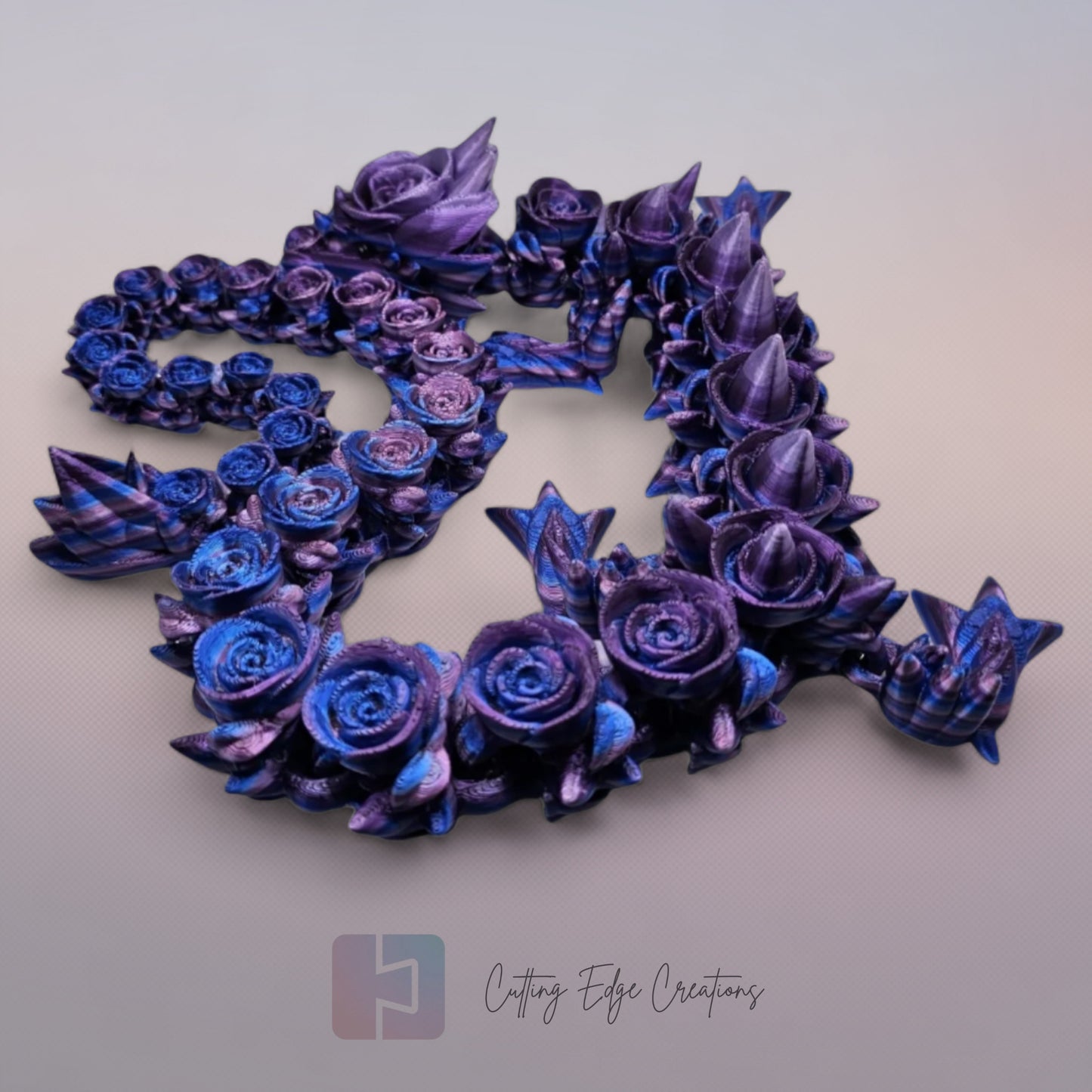3D printed articulated Rose Dragon, flexible toy, handmade in the UK, desk fidget and gift.