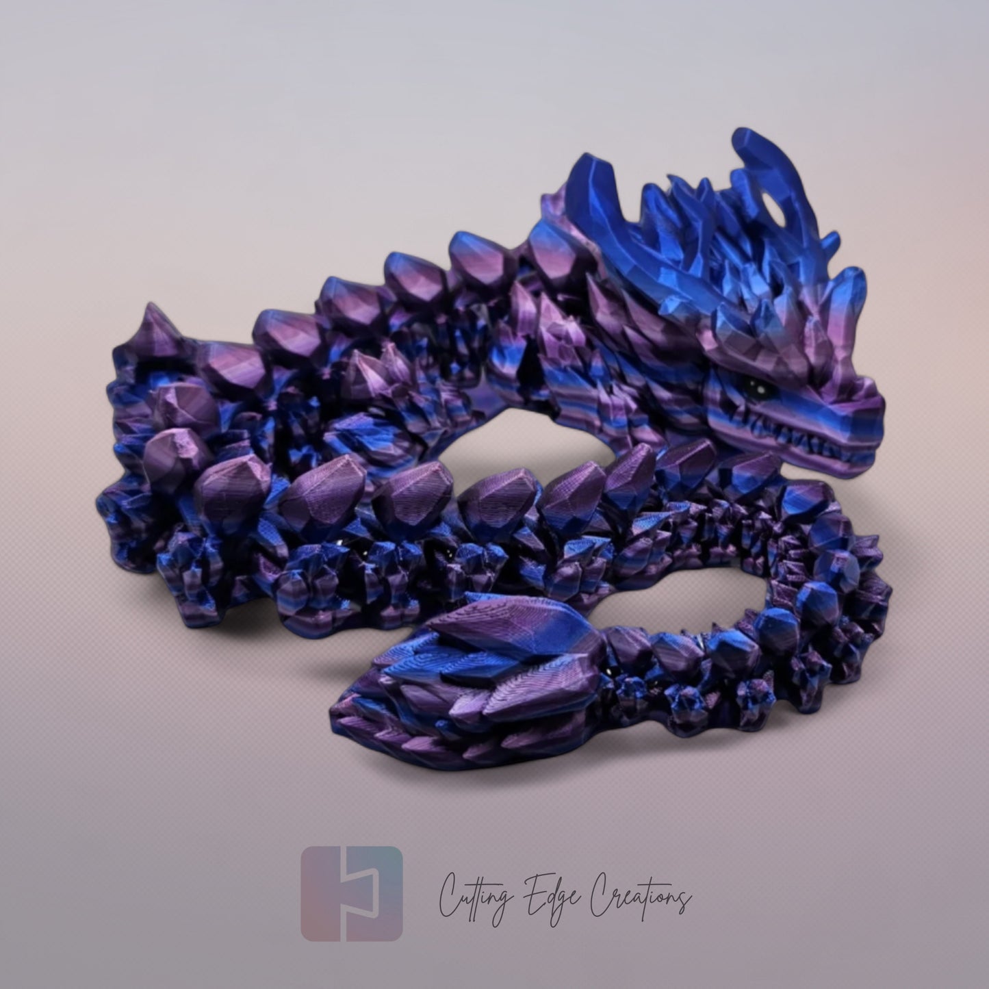 3D printed articulated Stone Horn Dragon, flexible toy, handmade in the UK, desk fidget and gift.