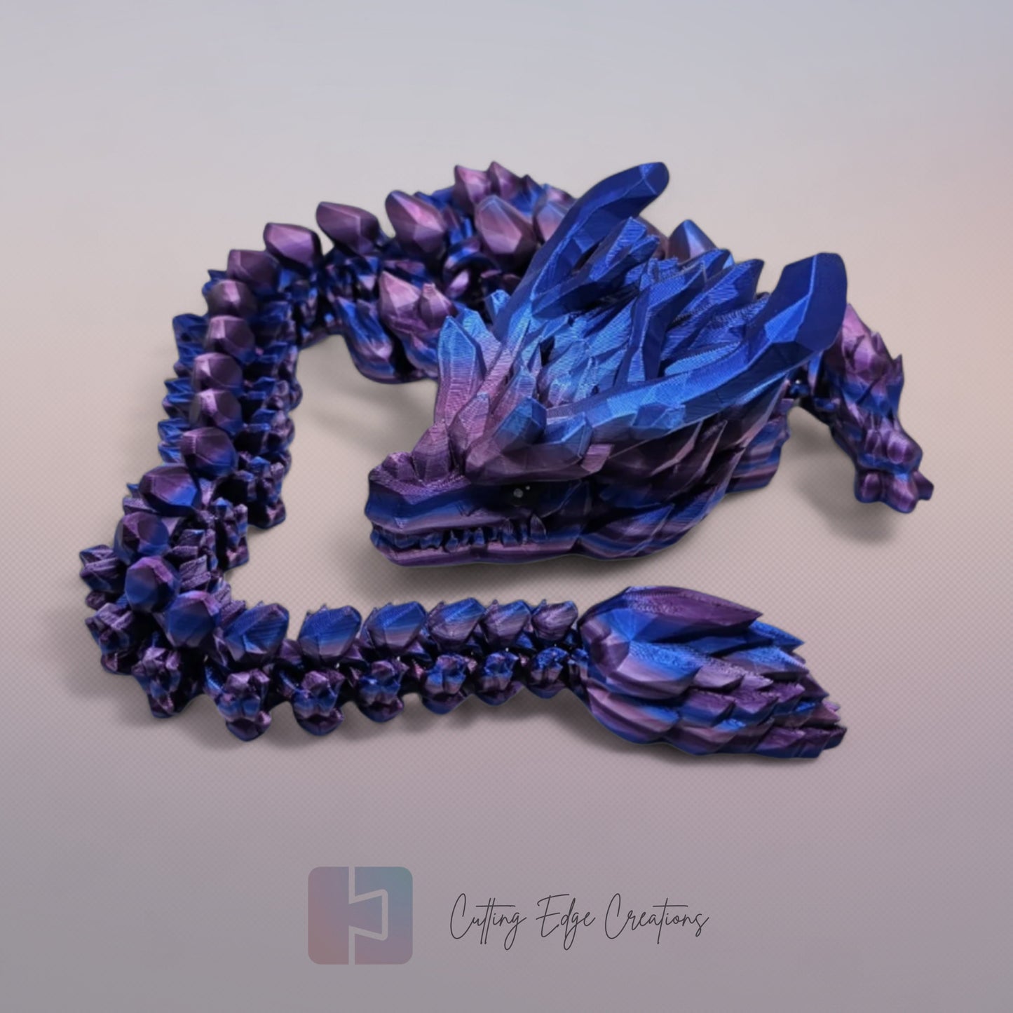 3D printed articulated Stone Horn Dragon, flexible toy, handmade in the UK, desk fidget and gift.