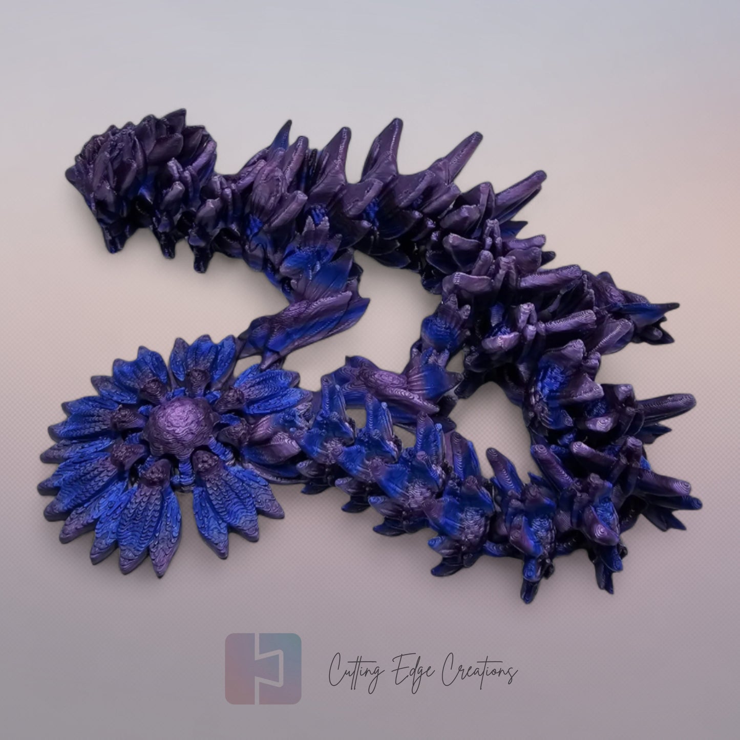 3D printed articulated Sunflower Dragon, flexible toy, handmade in the UK, desk fidget and gift.