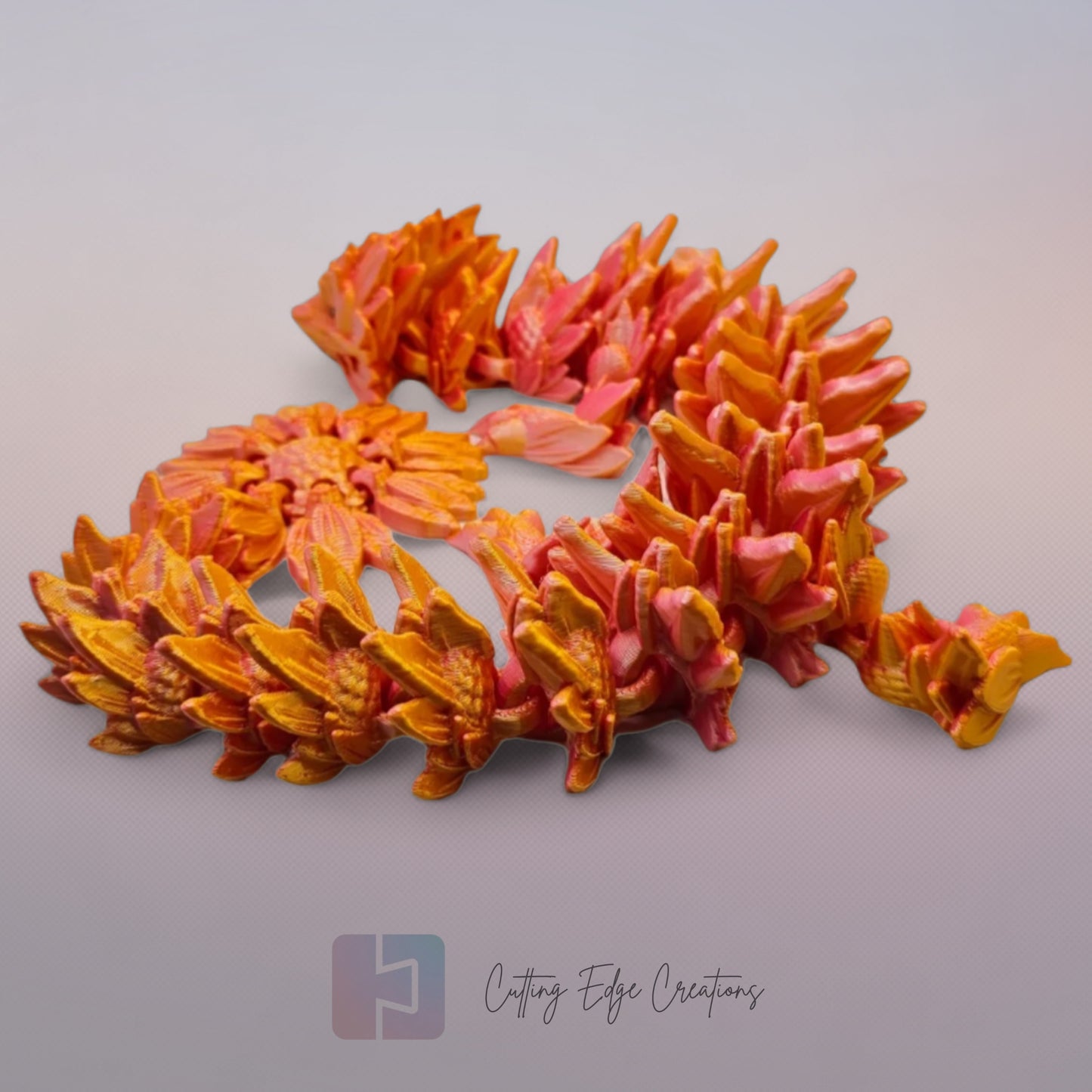 3D printed articulated Sunflower Dragon, flexible toy, handmade in the UK, desk fidget and gift.