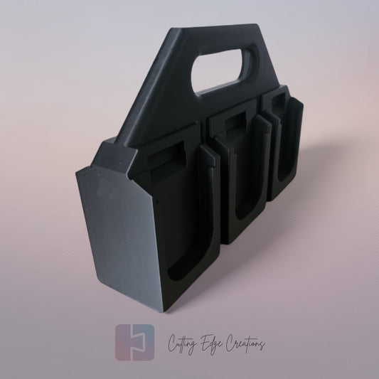 Black 3D printed battery caddy holding six Makita-compatible batteries with built-in carry handle