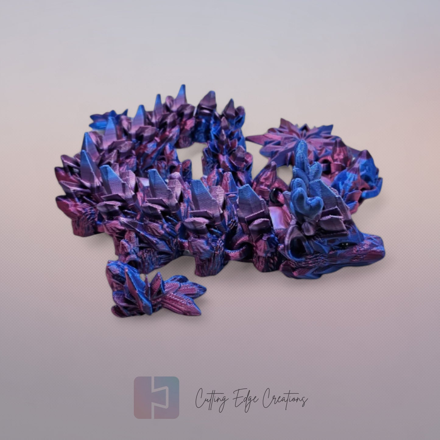 3D printed articulated Winter Dragon, flexible toy, handmade in the UK, desk fidget and gift.