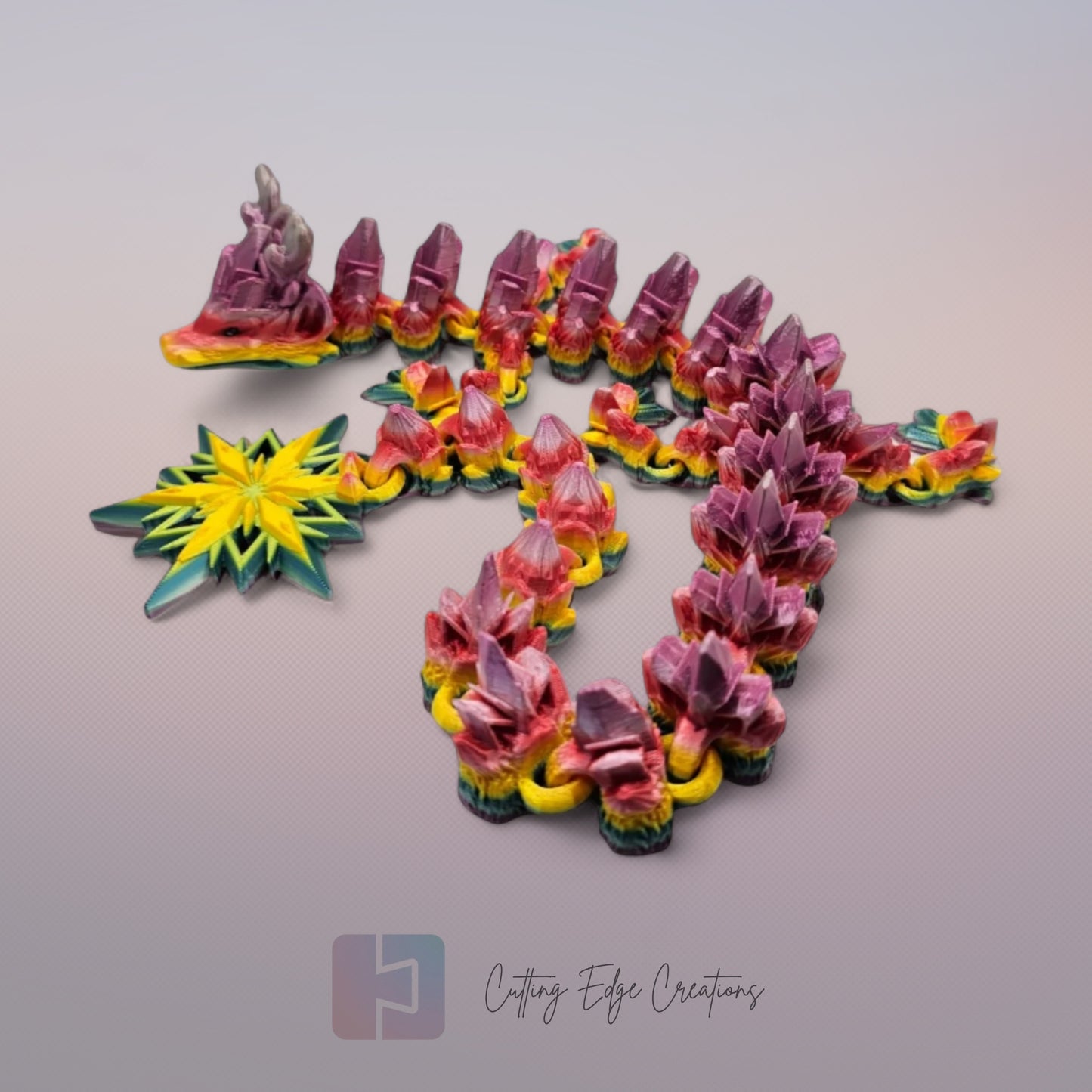 3D printed articulated Winter Dragon, flexible toy, handmade in the UK, desk fidget and gift.