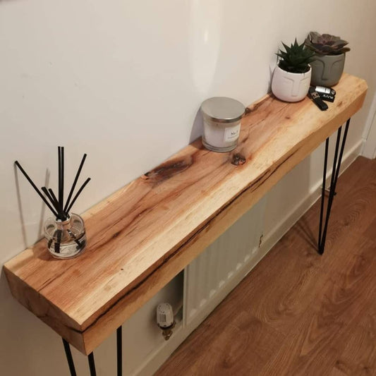 Solid oak console table with black hairpin legs, handmade in the UK, modern rustic furniture.