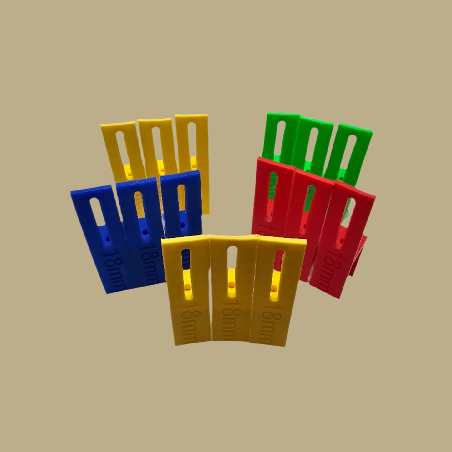 Set of three U Scribe jigs in bright colours for cabinet scribing and panel fitting