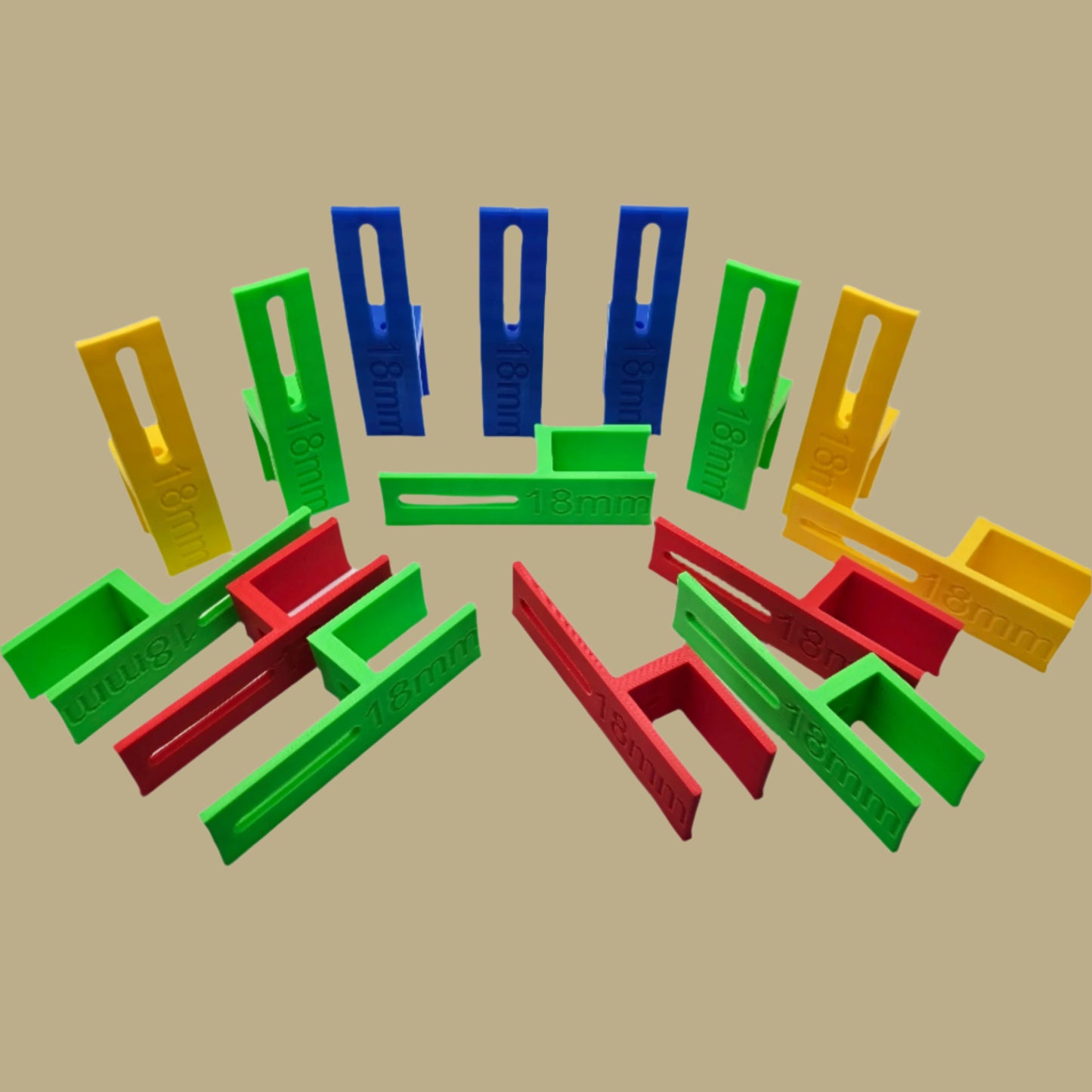 Set of three U Scribe jigs in bright colours for cabinet scribing and panel fitting