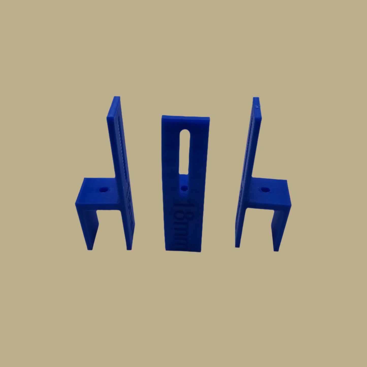 Set of three U Scribe jigs in bright colours for cabinet scribing and panel fitting