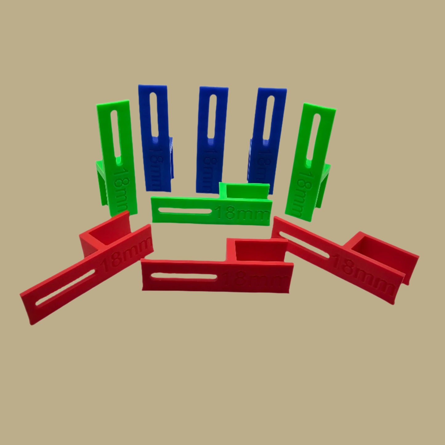 Set of three U Scribe jigs in bright colours for cabinet scribing and panel fitting